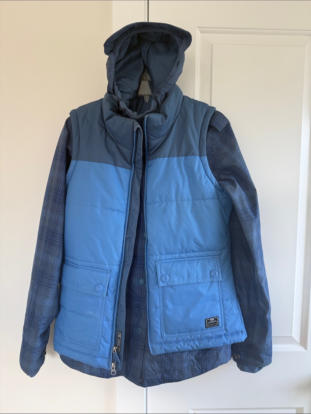 Nike Blue Hooded Ski Puffer Vest Over Plaid Jacket